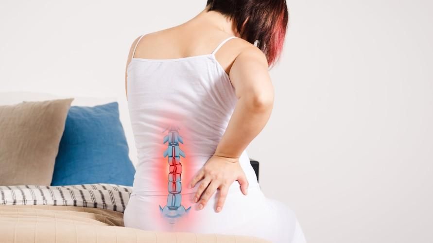 Comprendere i punti di riflessologia del mal di schiena per alleviare i muscoli tesi