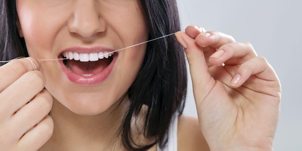 Ползите от използването на конец за зъби или конец за зъби за здраве